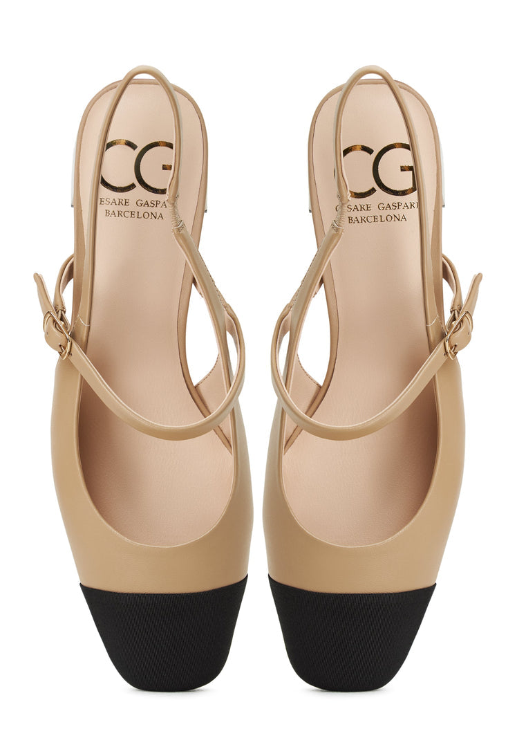 A stylish pair of Marisol beige slingback block heel pumps - the perfect combination of comfort and sophistication.