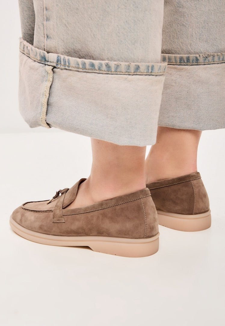 A stylish pair of women's fashion platform moccasins in dark beige, known as Aurelia shoes, perfect for a trendy and comfortable look.