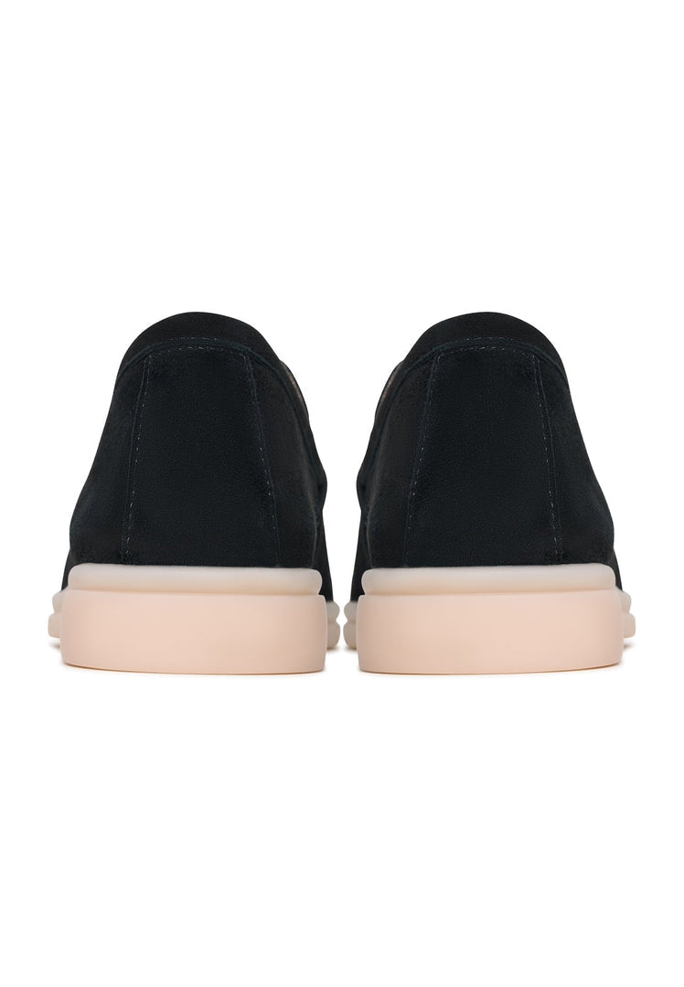 Stylish black leather platform moccasins for women by Aurelia - the perfect blend of fashion and comfort.