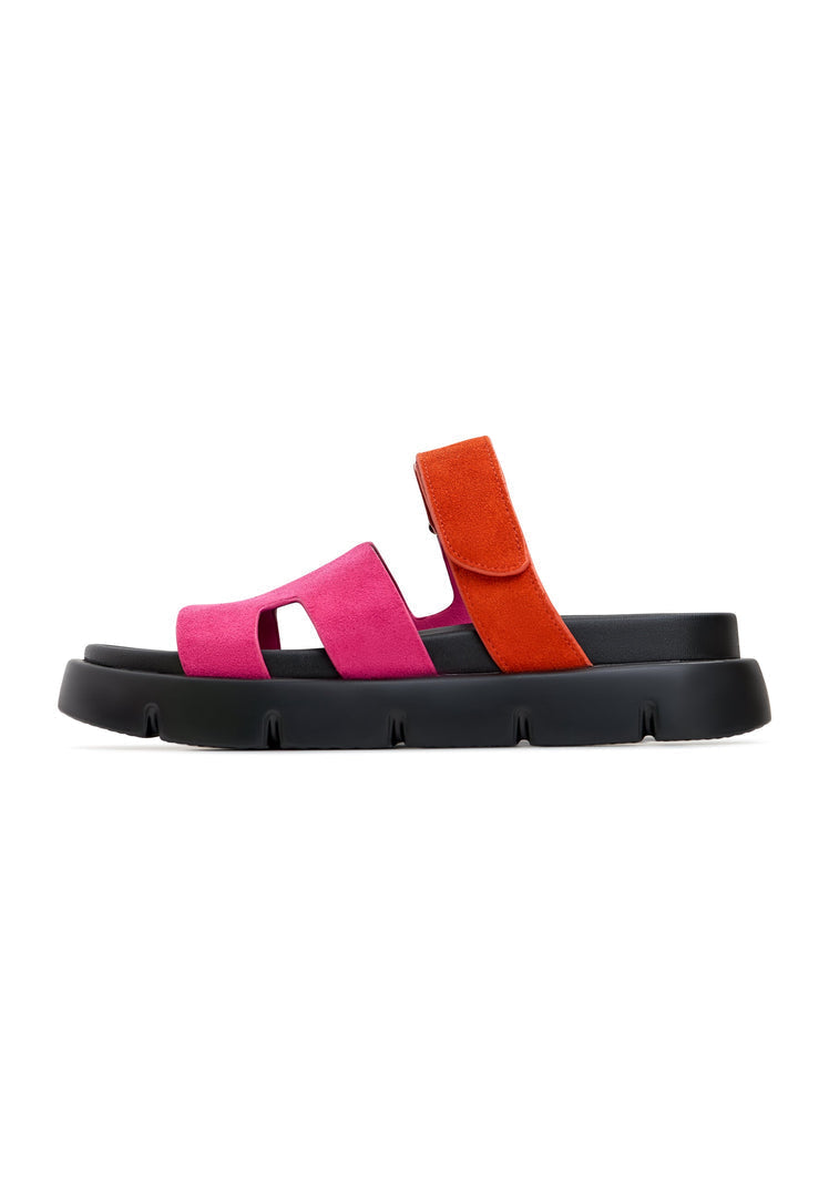 Chic pink platform mules with a sturdy black sole, perfect for adding a pop of color to any outfit. Kati platform mules in vibrant pink, ideal for stylish footwear enthusiasts.