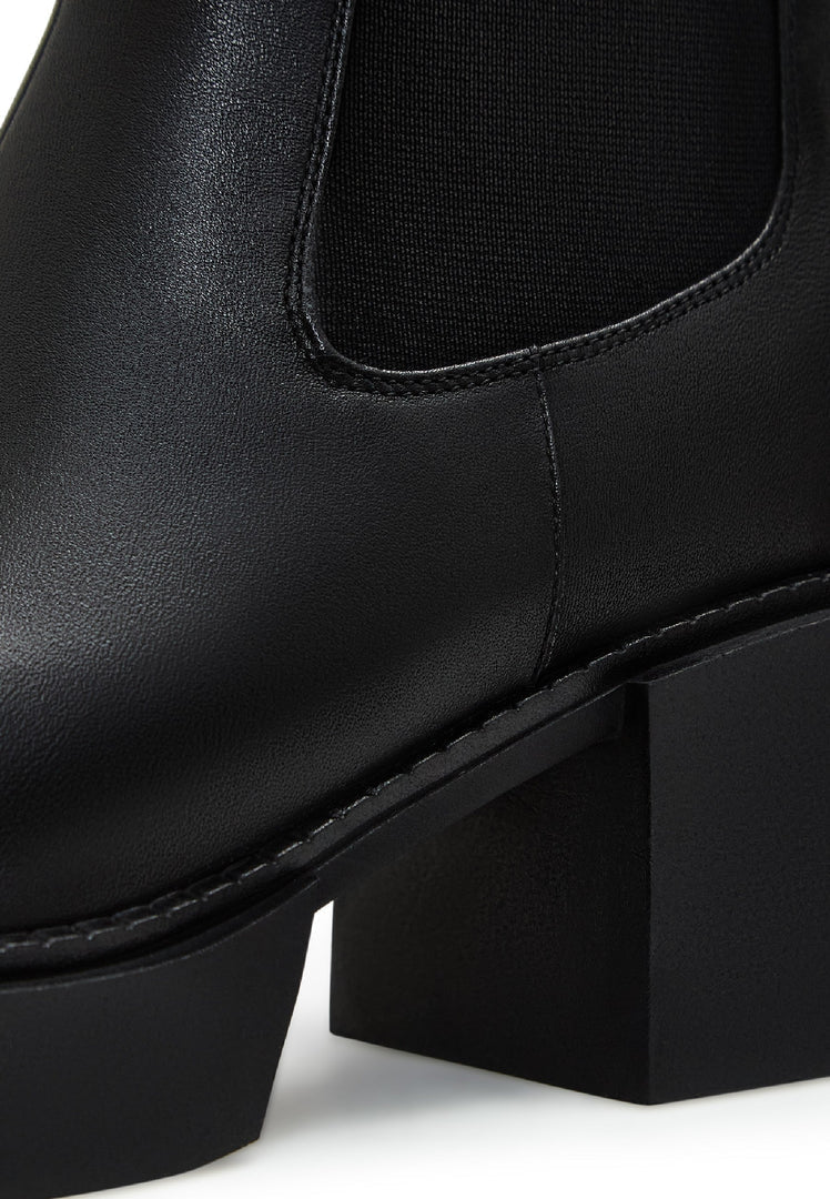 Pair of stylish black women's ankle boots, perfect for a casual and chic look. The Isa boots are a must-have for any wardrobe.