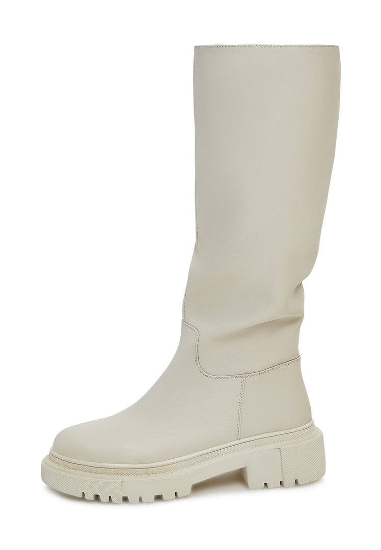 A stylish pair of women's fashion knee-high leather boots in beige, also known as Anastasia beige boots.