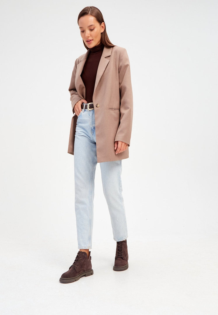 A pair of stylish flat sole ankle boots, comfortable and trendy, perfect for casual wear.