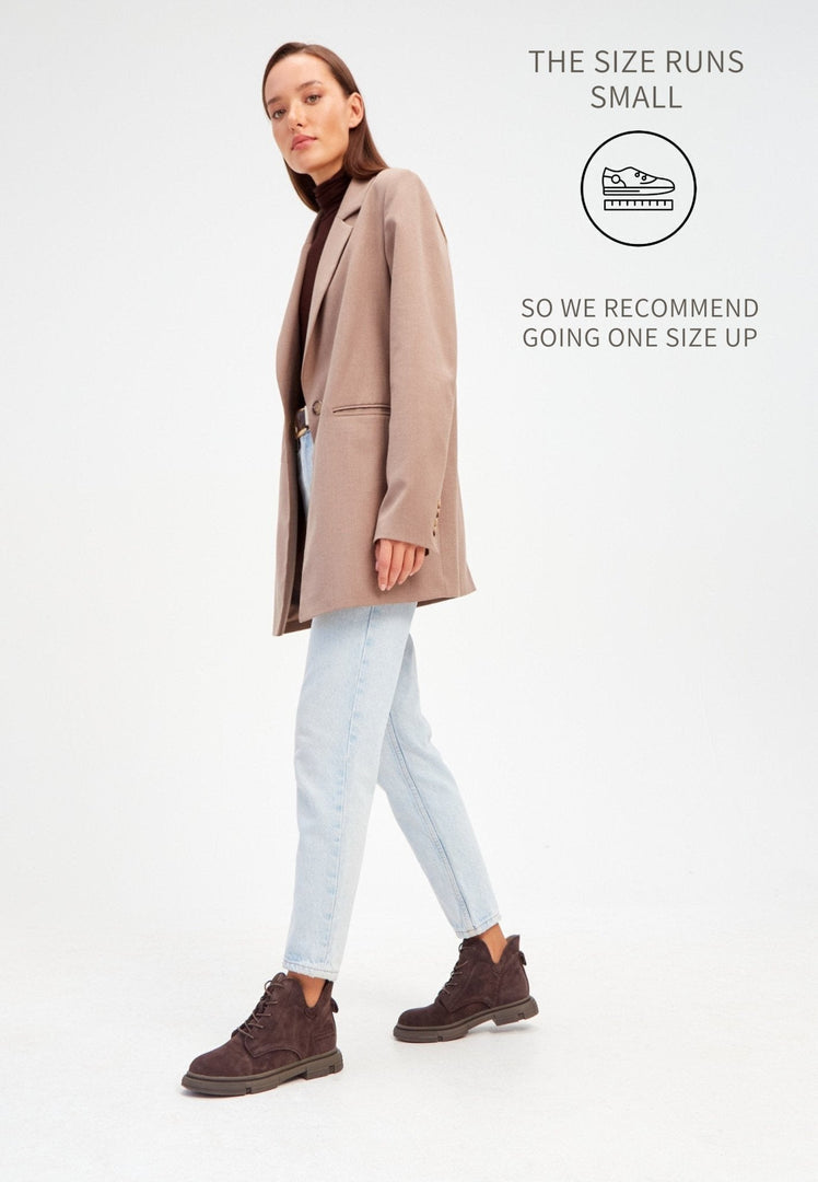 Stylish and comfortable flat sole ankle boots, perfect for casual wear. Trendy and chic flat boots for everyday style.