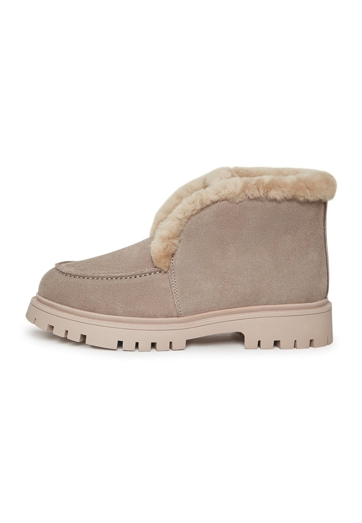 A stylish pair of women's suede ankle winter boots, perfect for the colder months.