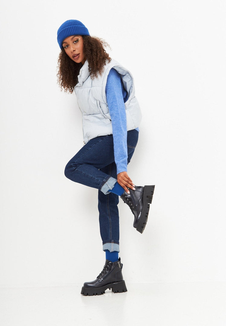 A pair of stylish lace-up ankle boots in a trendy blue color, perfect for a fashionable look.