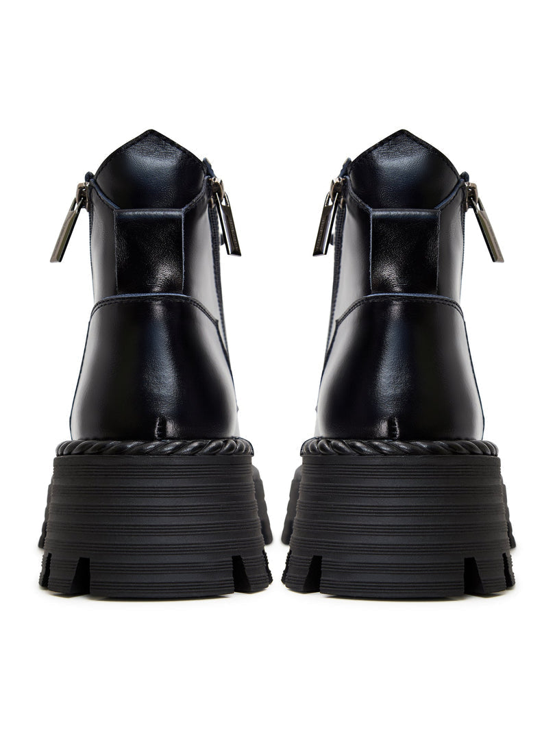 A pair of stylish lace-up ankle boots in blue, perfect for a fashionable look.