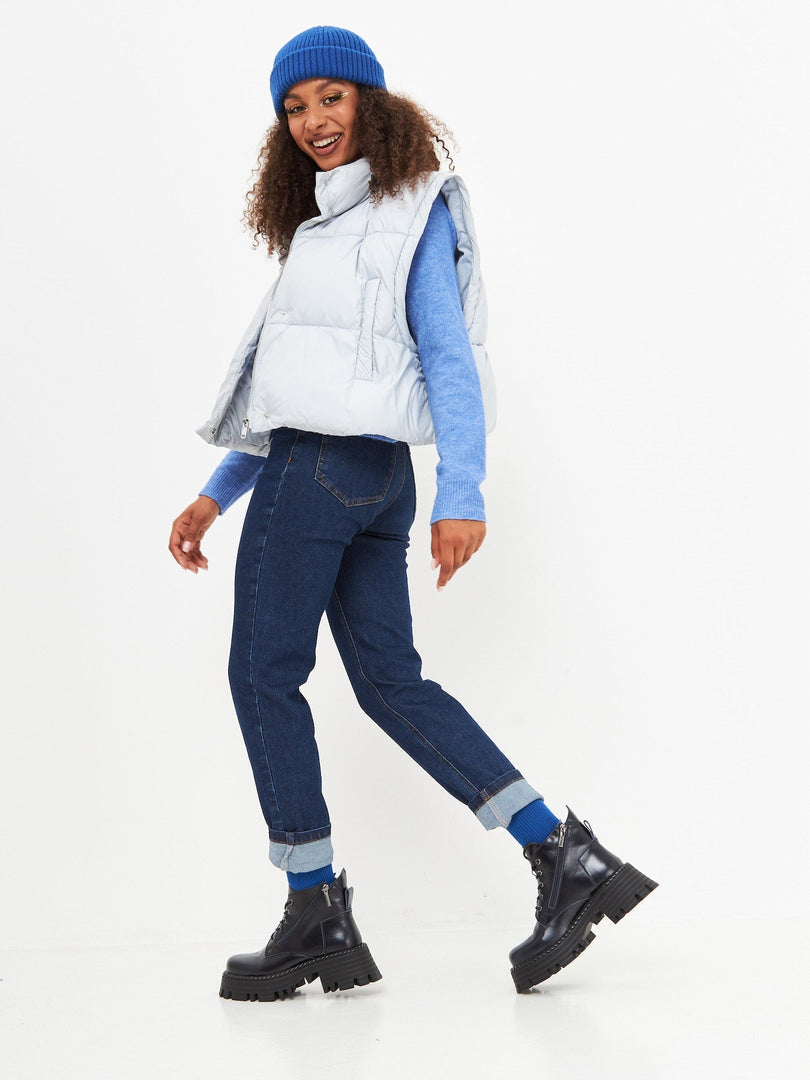 A pair of fashionable blue lace-up ankle boots, perfect for a stylish look.