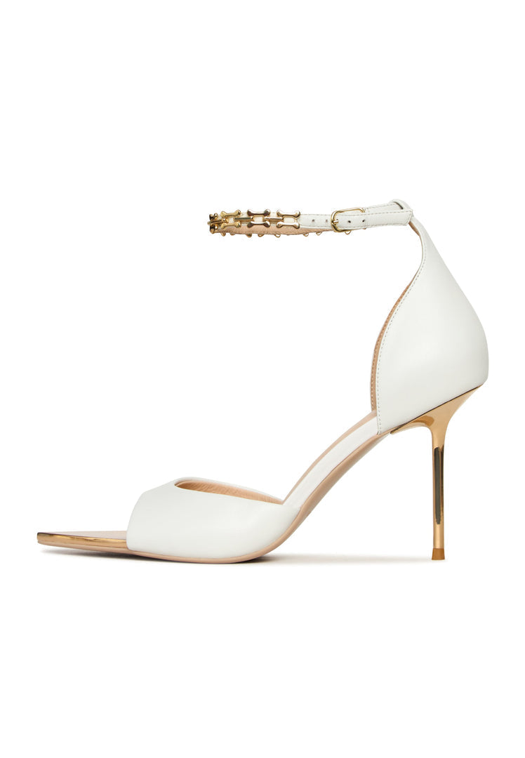 "White stiletto high-heeled sandals, perfect for any occasion - buy your pair of white stiletto sandals online now!"