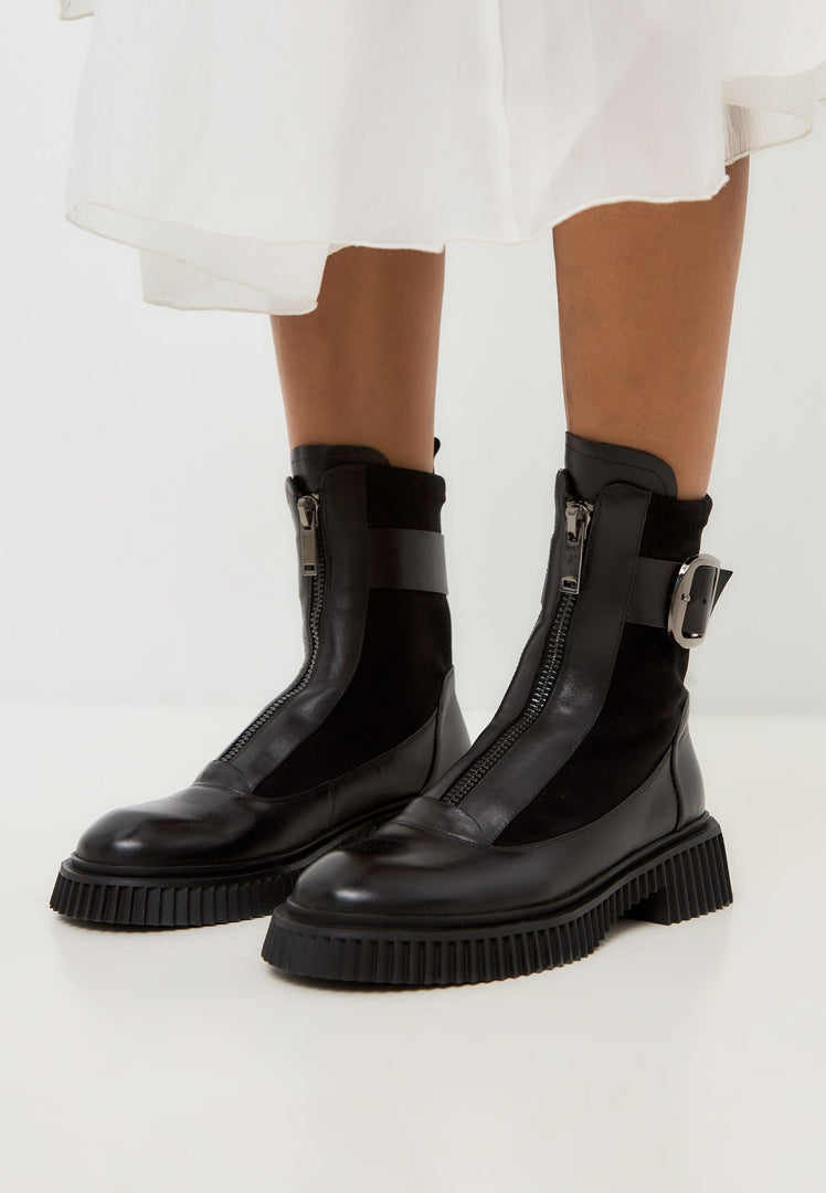 A trendy pair of black Ciara chunky sole ankle boots - stylish and versatile.