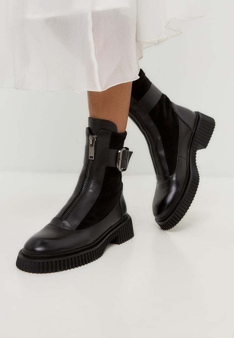A fashionable pair of chunky sole Ciara ankle boots in black, perfect for a stylish look.