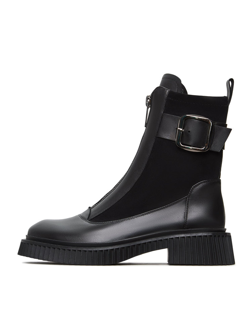 A stylish pair of black Ciara ankle boots with a chunky sole design, ideal for a trendy and edgy look.