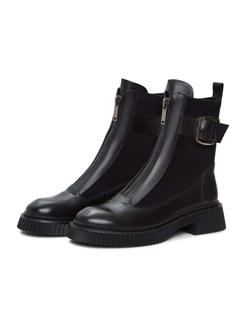 A stylish pair of black Ciara ankle boots with chunky soles, perfect for a trendy and chic look.