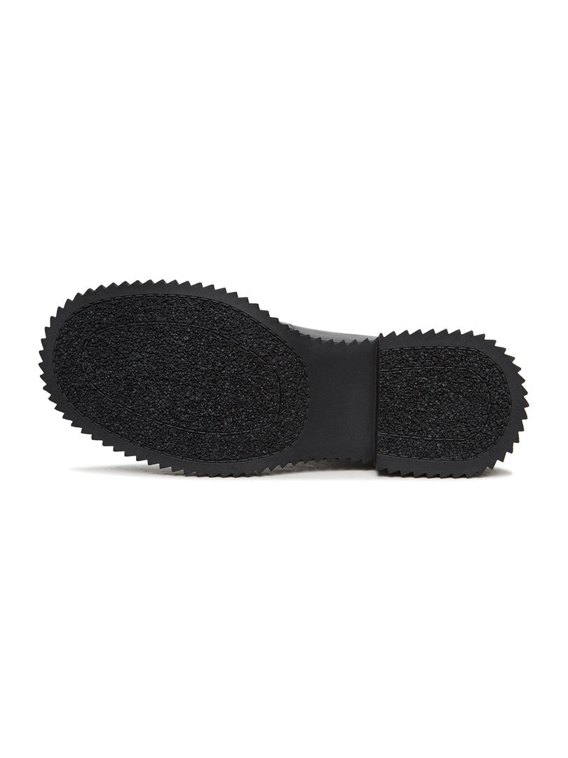 A stylish pair of black Ciara chunky sole ankle boots, perfect for a fashionable statement look.
