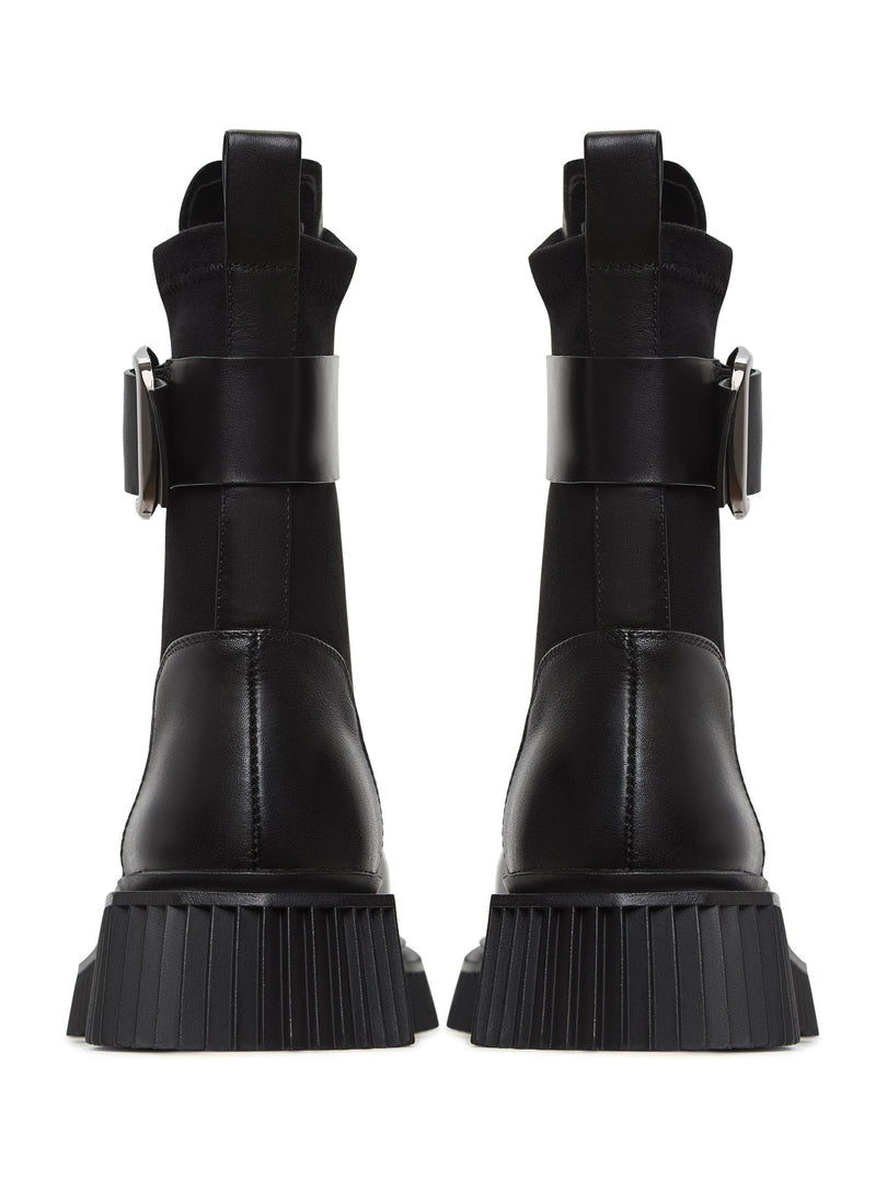 A trendy pair of black Ciara ankle boots with chunky soles - the perfect stylish addition to any outfit.