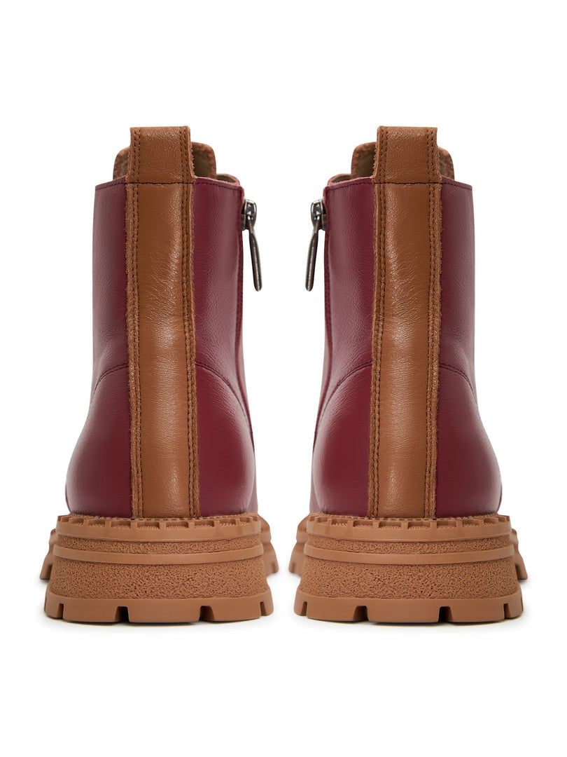 A pair of stylish women's Bordeaux leather ankle lace-up boots, perfect for elevating your fashion footwear collection.
