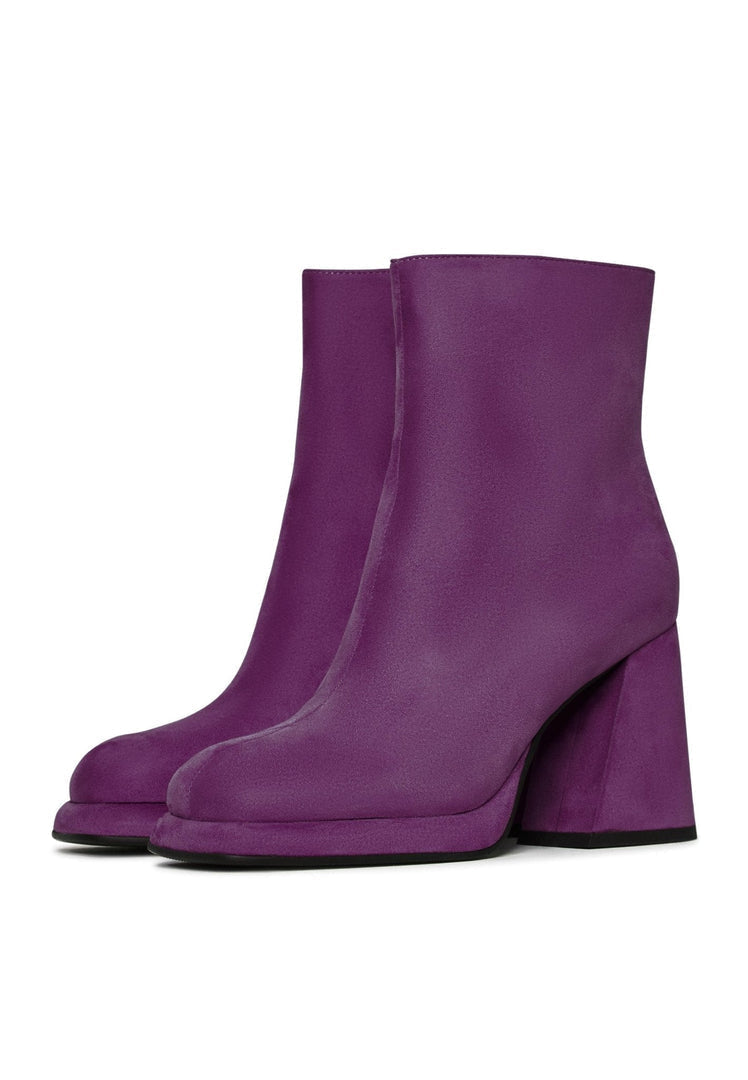 A stylish pair of women's purple ankle boots with a casual block heel, perfect for adding a pop of color to your wardrobe.