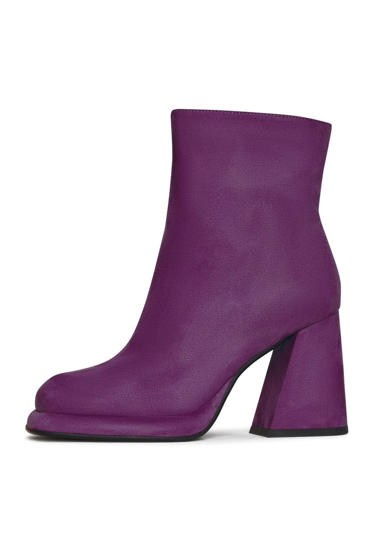 A stylish pair of women's purple ankle boots with a casual block heel, perfect for adding a fashionable touch to any outfit.