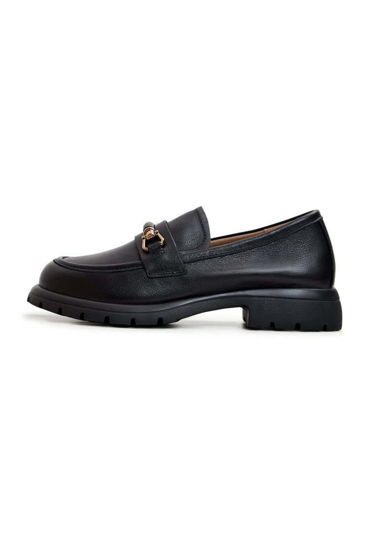 A stylish pair of black leather platform loafers - the perfect trendy addition to a women's wardrobe.