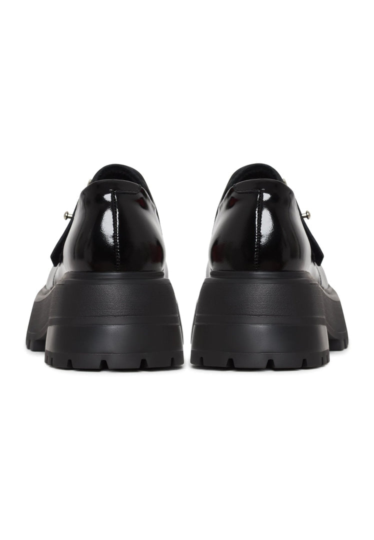 A stylish pair of unisex black leather loafers, perfect for men and women looking for a classic and sophisticated slip-on shoe option.