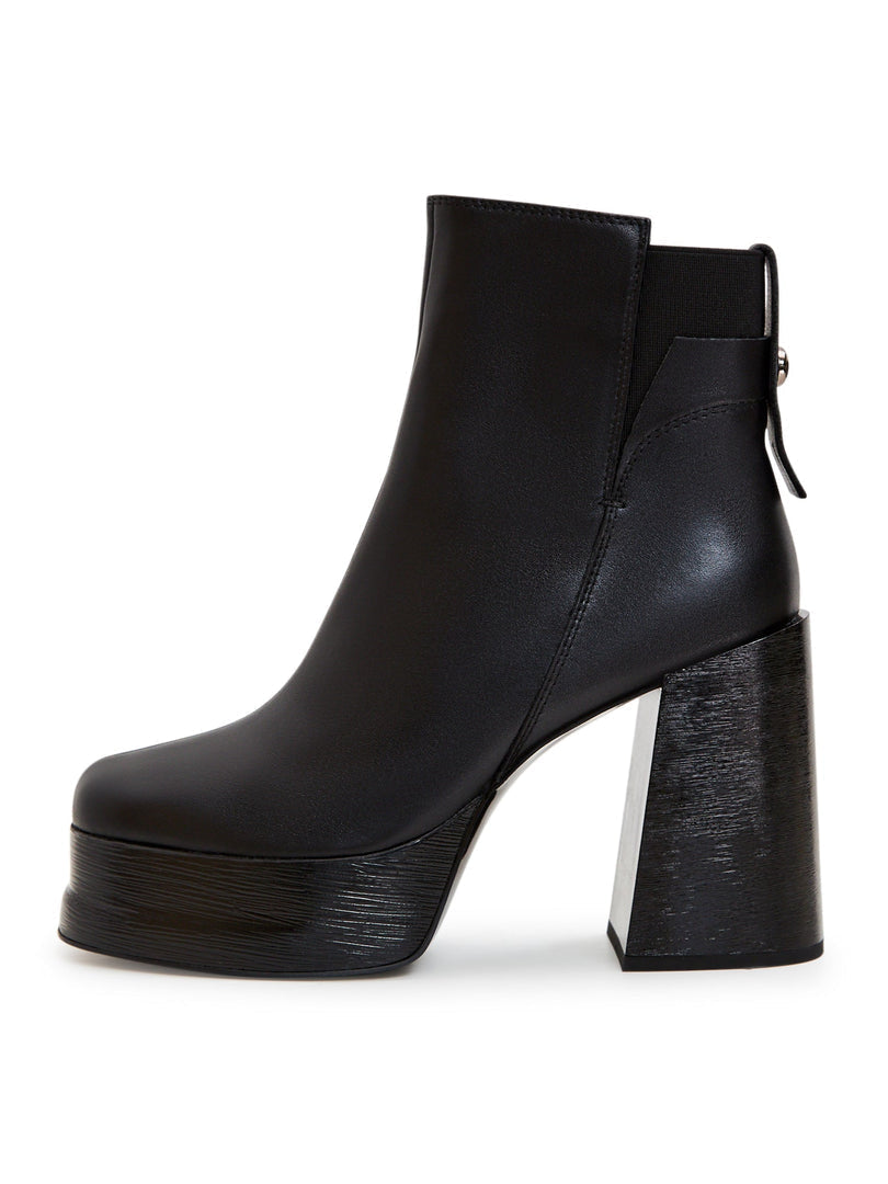A pair of stylish leather ankle boots with block heels - the perfect combination of fashion and comfort.