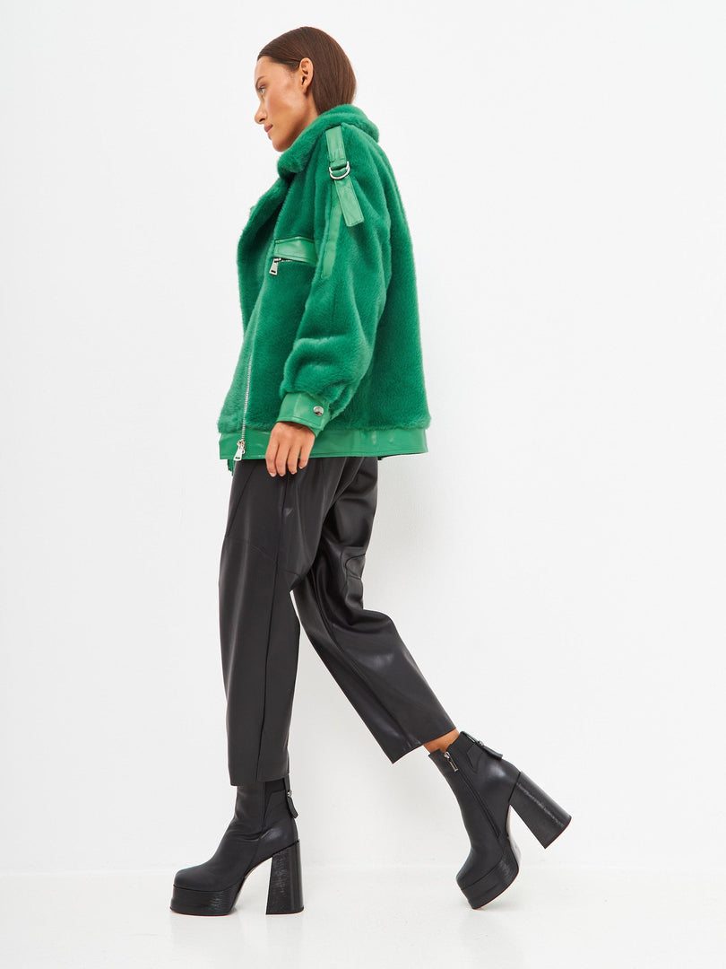 A pair of stylish leather ankle boots with block heels, perfect for stepping out in style.