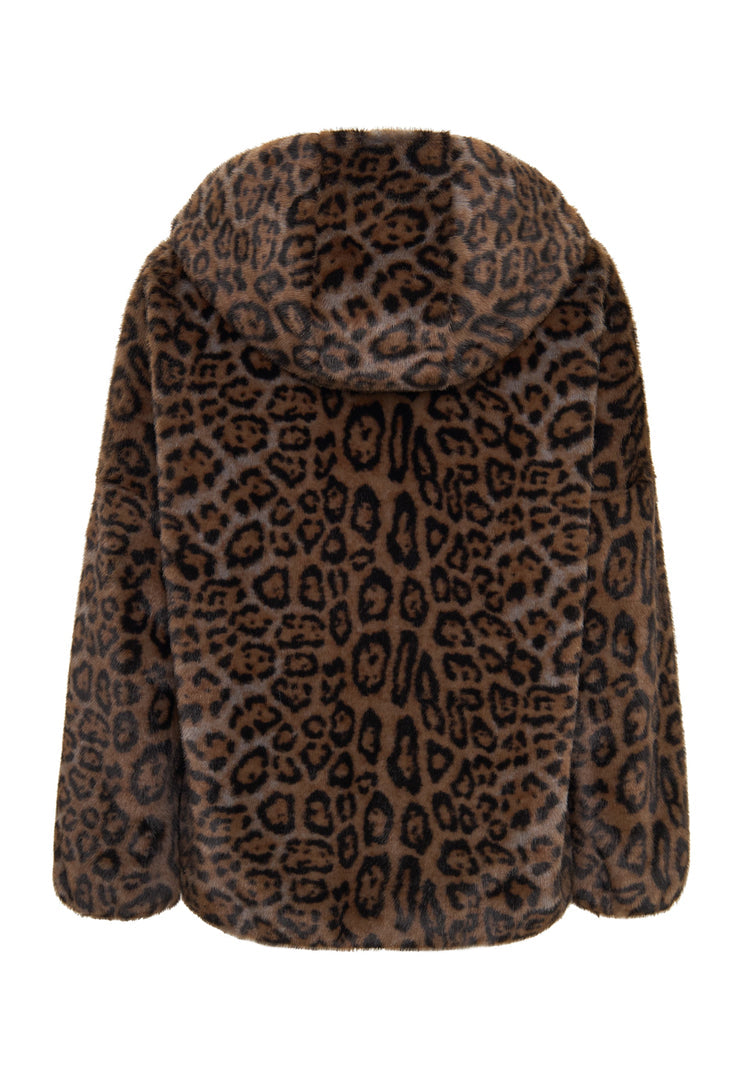 A fashionable woman wearing a stylish hooded faux fur jacket, the Reyna leopard jacket, making a trendy statement with this faux fur outerwear.