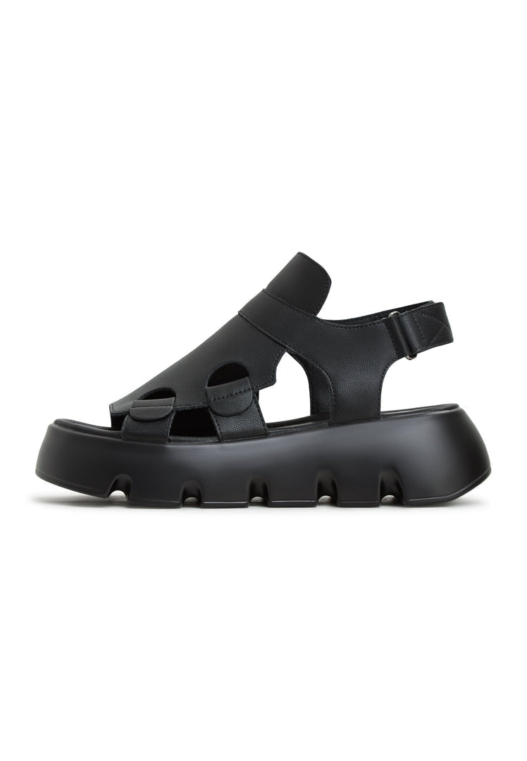 Stylish Amelie Black Platform Sandals featuring a unique sporty design and thick sole, perfect for trendy shoppers seeking comfort and flair.