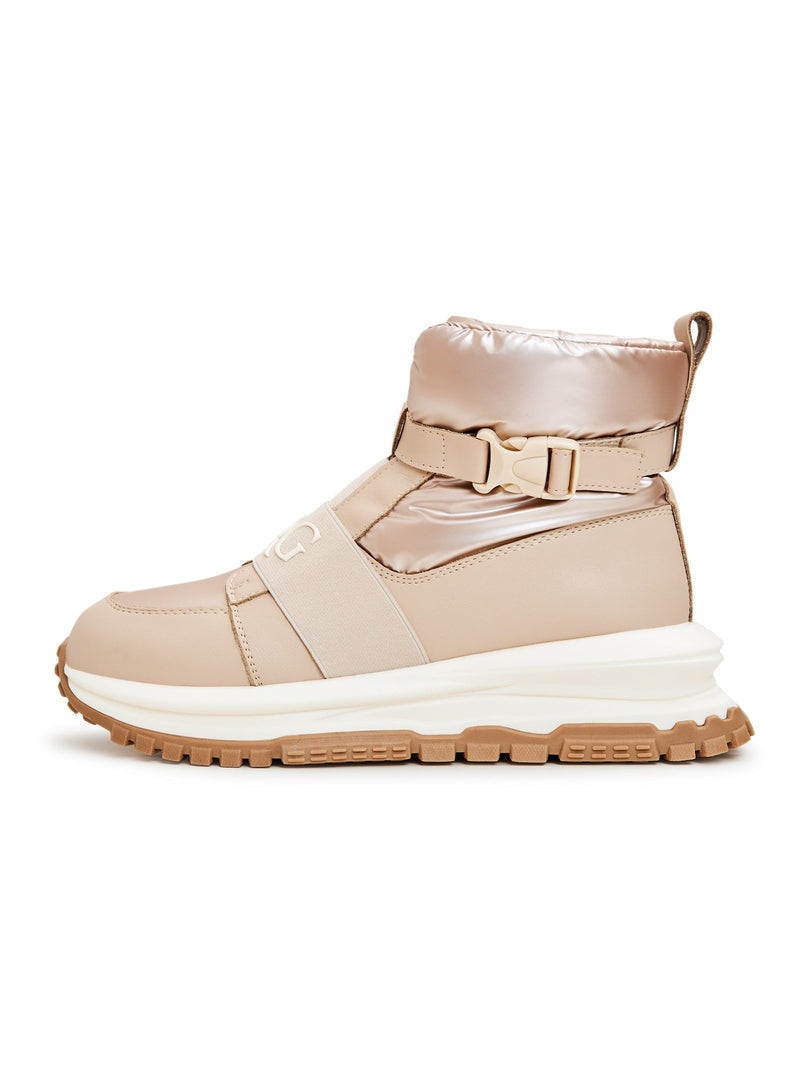 A stylish pair of beige winter ankle boots that double as sneaker boots, perfect for staying warm and fashionable in the cold weather.