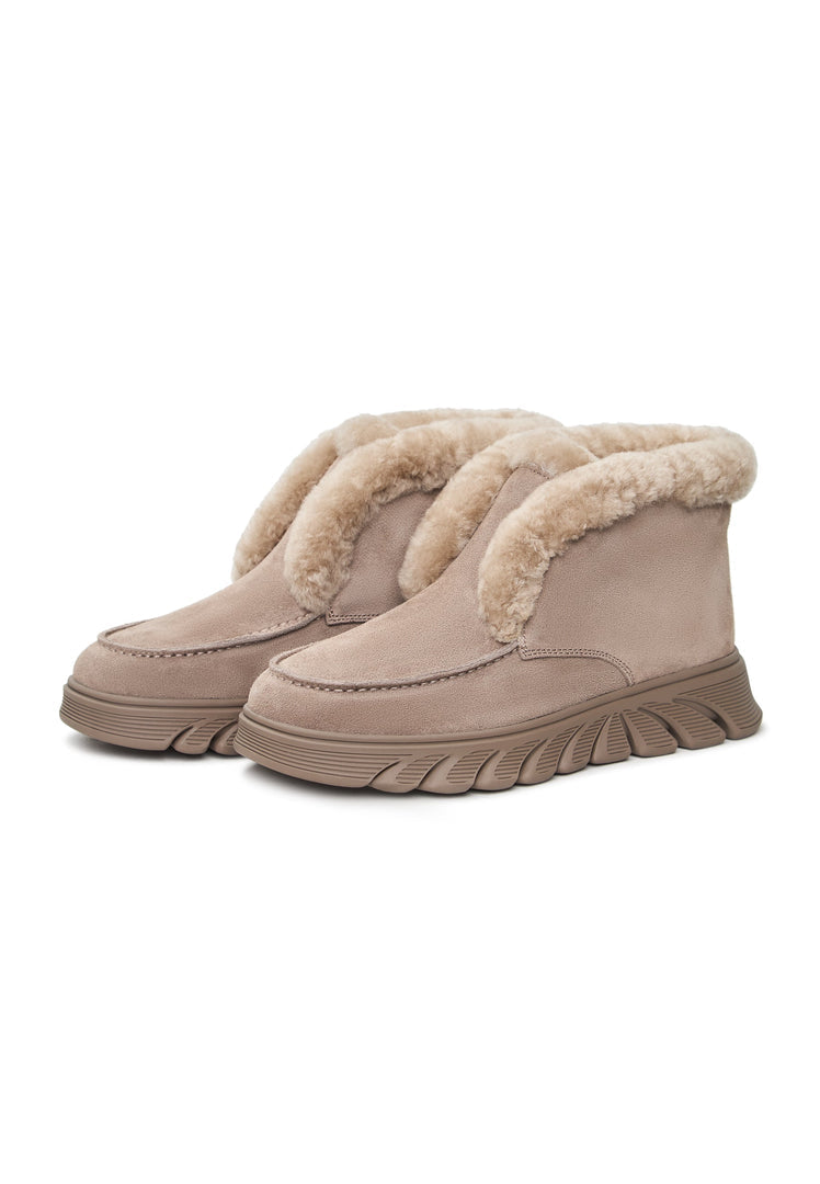 A close-up image of taupe shearling-lined Adriana brown ankle boots, perfect for women seeking cozy and stylish shearling-lined footwear.