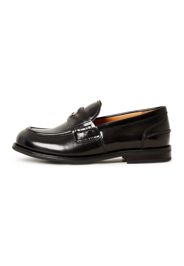 A stylish pair of women's black leather loafers with a block heel, known as the Dinara black shoes.