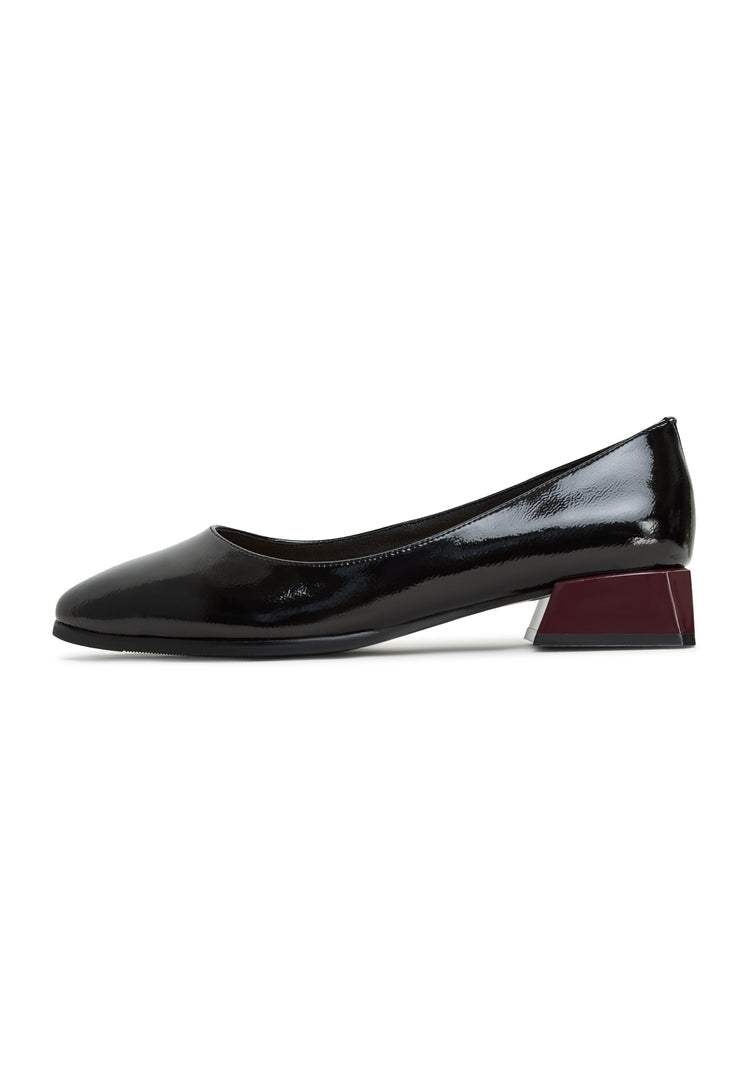 A stylish pair of women's black block heel ballerinas, also known as Ingrid shoes, perfect for a trendy and comfortable look.