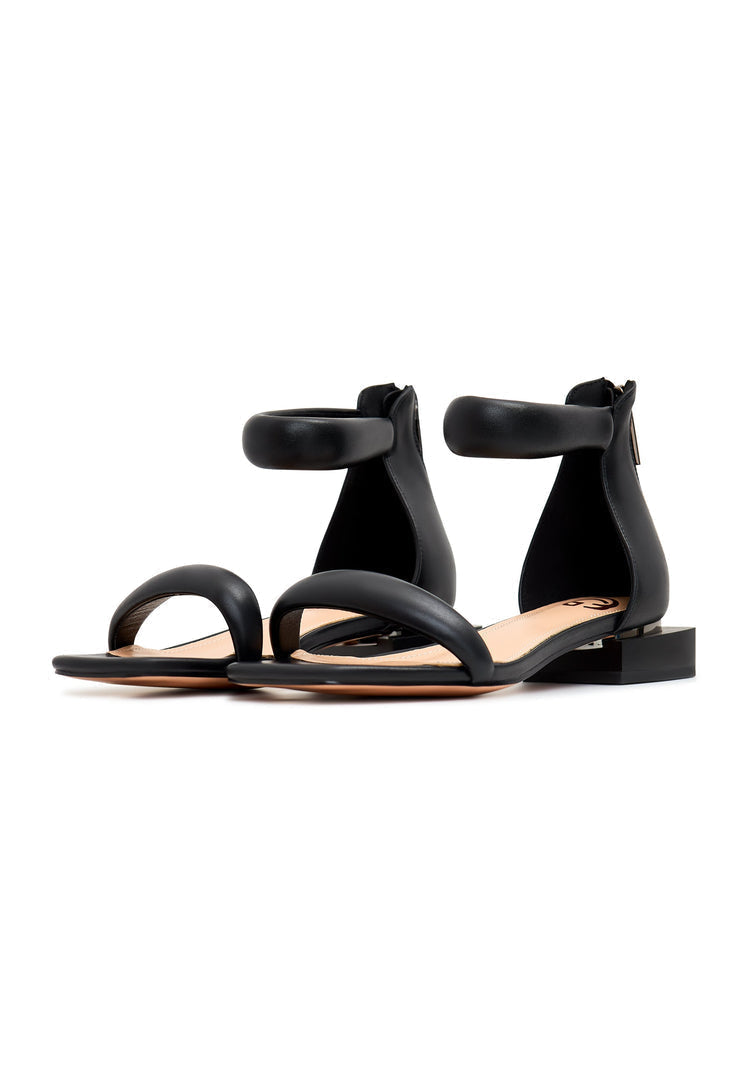 A stylish pair of black Sofia block heel sandals, perfect for adding a touch of elegance to any outfit.