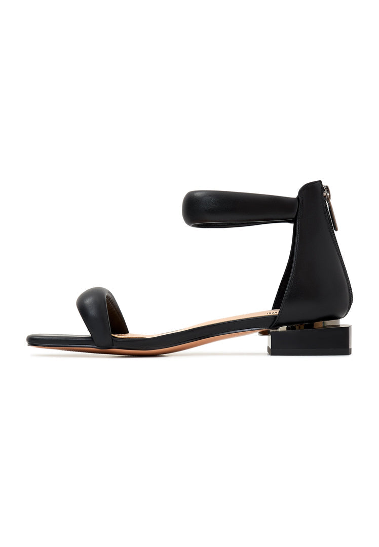 A stylish pair of black Sofia block heel sandals, perfect for adding a touch of sophistication to any outfit.