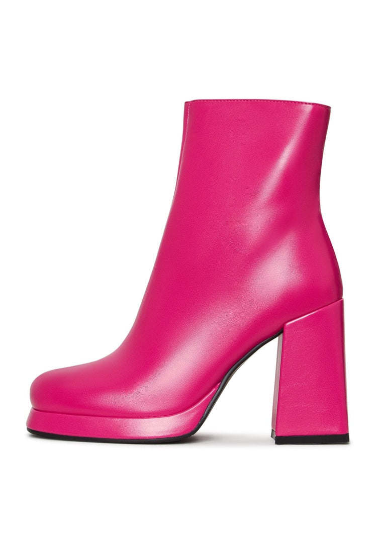 A stylish pair of pink ankle boots - the perfect blend of comfort and style for women's footwear fashion.