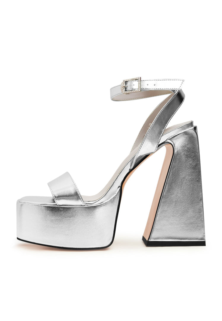 Pair of elevated elegance silver sandals for sale, perfect for adding a touch of stylish sophistication to any outfit.