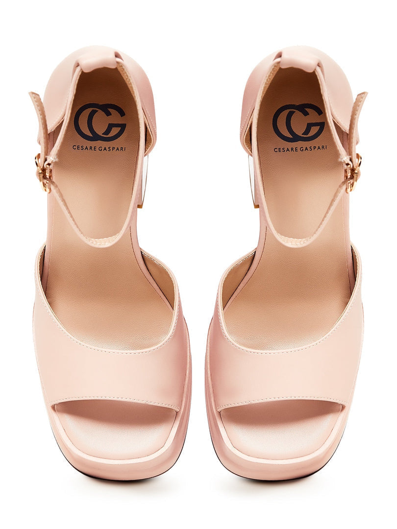 A stylish pair of classic beige open toe heels, perfect beige high heel sandals for women fashionistas.