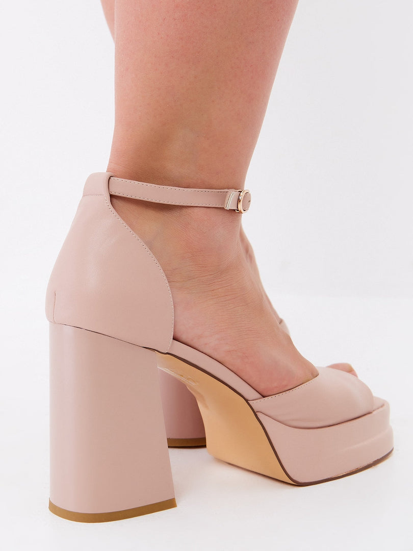A pair of elegant classic beige open toe heels - beige high heel sandals for women, perfect for a stylish and sophisticated look.