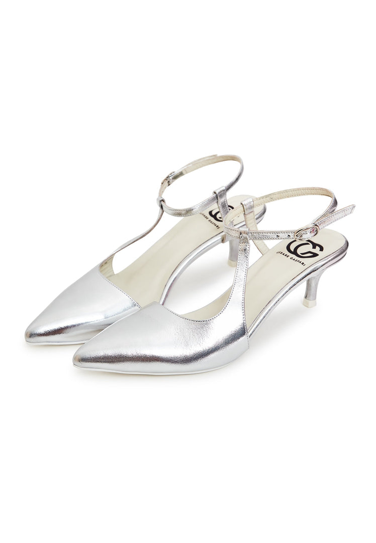 A pair of sleek silver pumps, perfect for elevating any look with their elegant design and luxe appeal, ideal for women seeking high-end footwear.