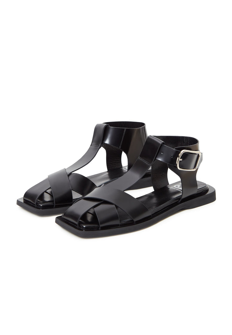 These stylish black flat sole ankle cuff sandals are a must-have! Buy them online now for the perfect combination of comfort and style.