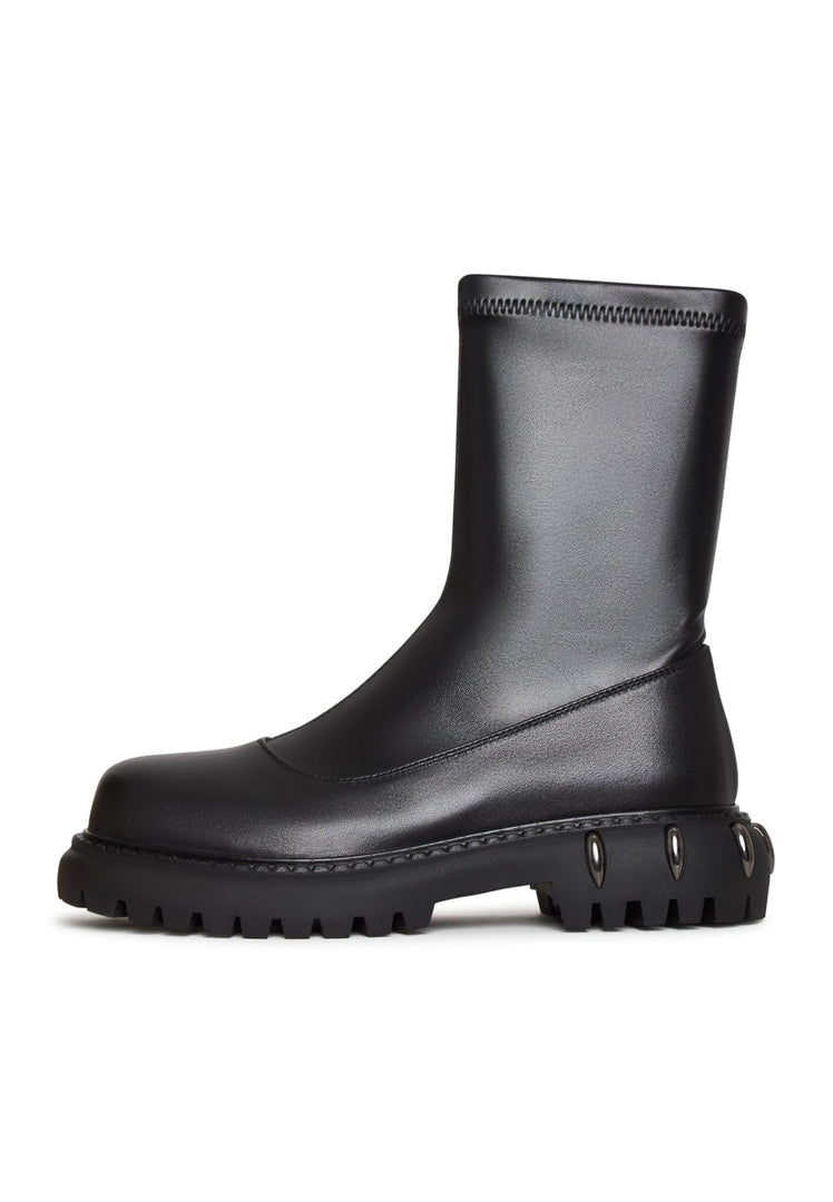 A pair of stylish and comfortable leather ankle boots, perfect for any casual outfit, featuring a trendy platform design.
