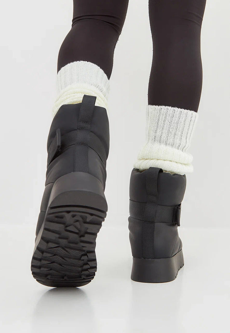 Stay warm and stylish this winter with black wool-lined urban boots featuring a cozy wool lining for extra comfort.