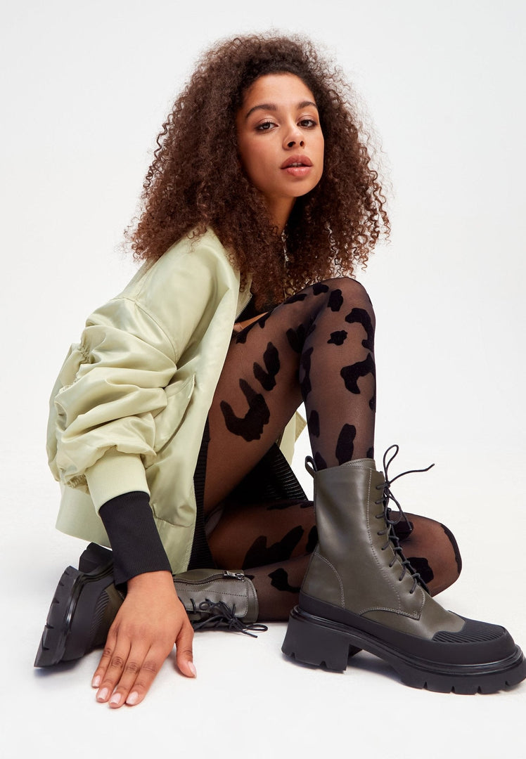 A pair of stylish suede lace-up ankle boots for a casual and trendy look.