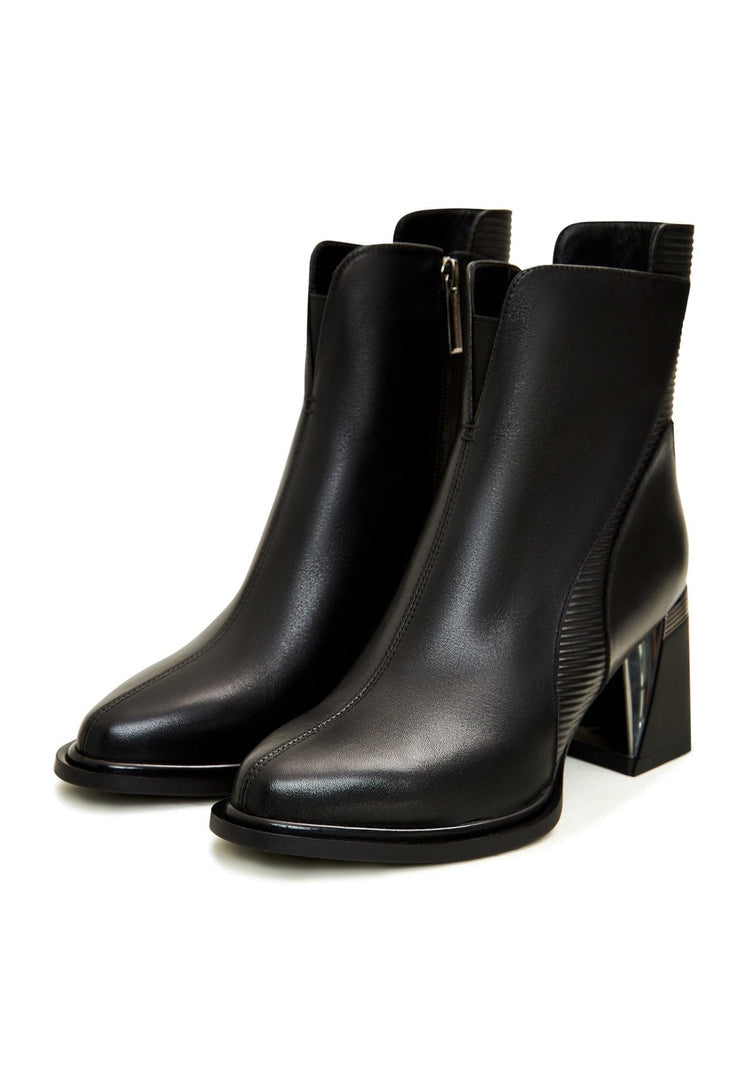 A stylish pair of black block heel ankle boots with a sleek design perfect for any outfit.