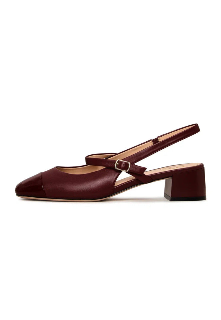 A stylish pair of Women's Bordeaux pumps featuring elegant slingback block heels, also known as Marisol pumps, perfect for a chic and sophisticated look.