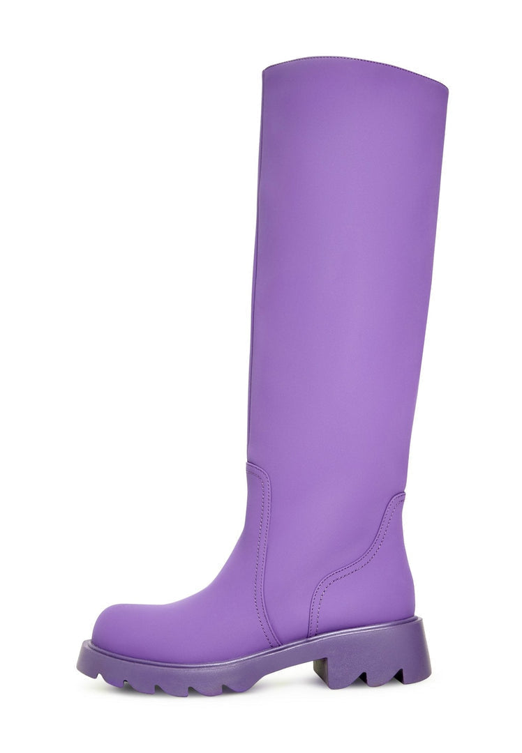 A stylish pair of women's knee-high chunky sole purple fashion boots.