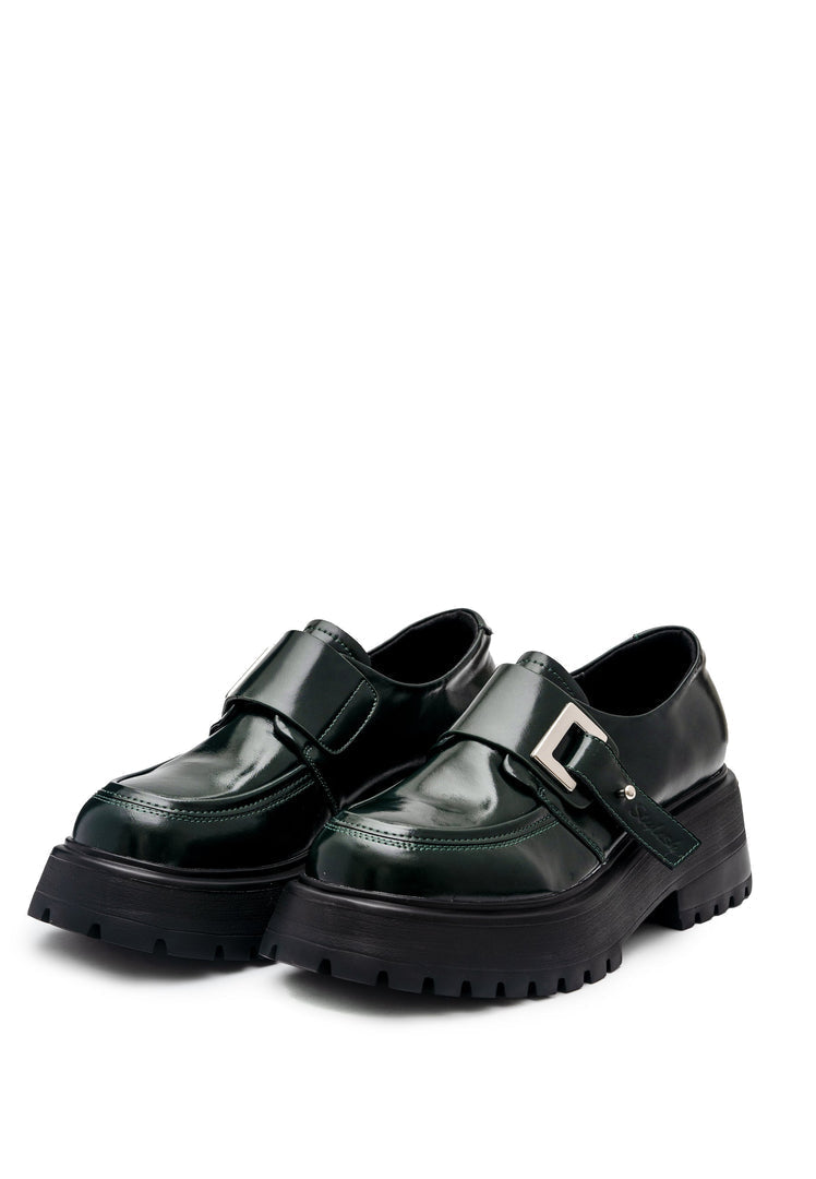 A stylish pair of premium green leather loafers, perfect for men and women looking to step up their fashion game.