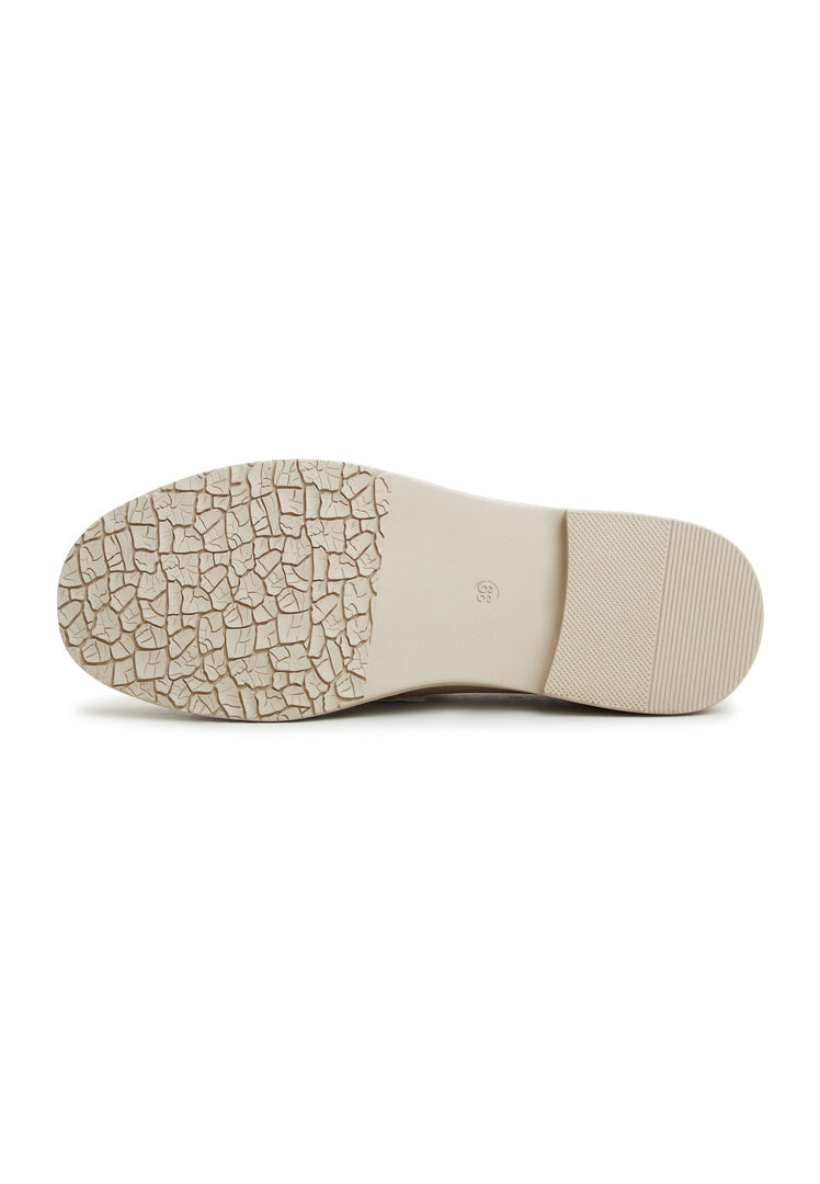 A stylish pair of block heeled beige loafers known as Stephanie loafers, perfect for women's fashion.