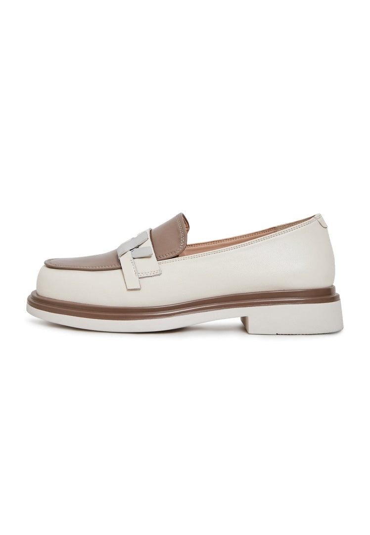 A trendy pair of beige slip-on block heel loafers for women, perfect for adding a stylish touch to any outfit.
