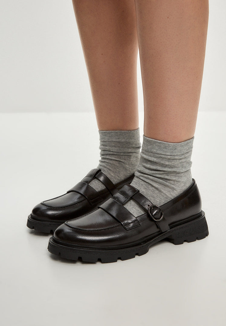A stylish pair of Marina leather platform loafers, perfect for casual chic outfits.